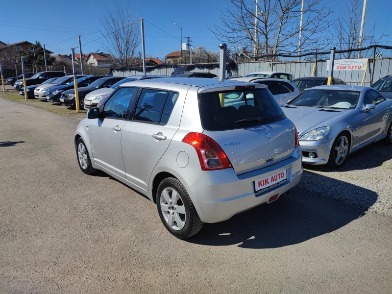 Suzuki Swift 1.3DDIS-75ks-КЛИМАТИК, снимка 8 - Автомобили и джипове - 49585099