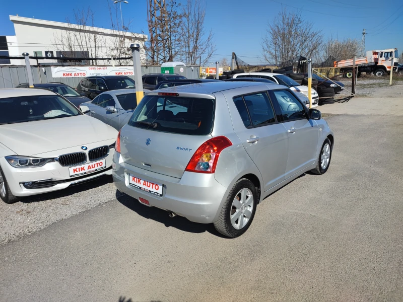 Suzuki Swift 1.3DDIS-75ks-КЛИМАТИК, снимка 6 - Автомобили и джипове - 49585099