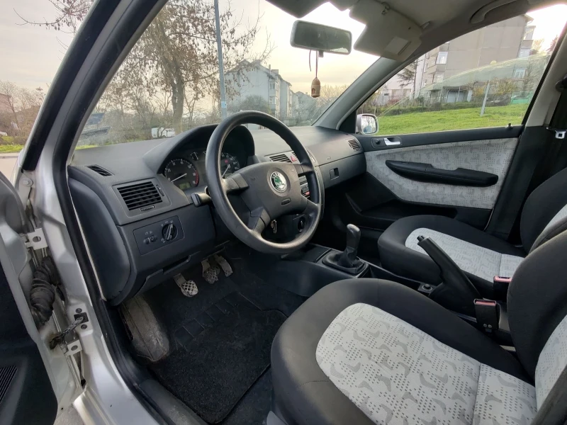 Skoda Fabia 1.4i 16V, снимка 8 - Автомобили и джипове - 52844633