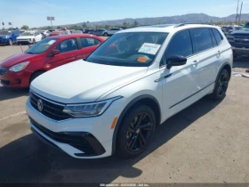 VW Tiguan 2.0T SE R-LINE BLACK, снимка 1