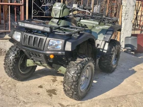 ������ Arctic Cat TRV