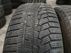 Гуми Зимни 235/60R18, снимка 1 - Гуми и джанти - 46991015