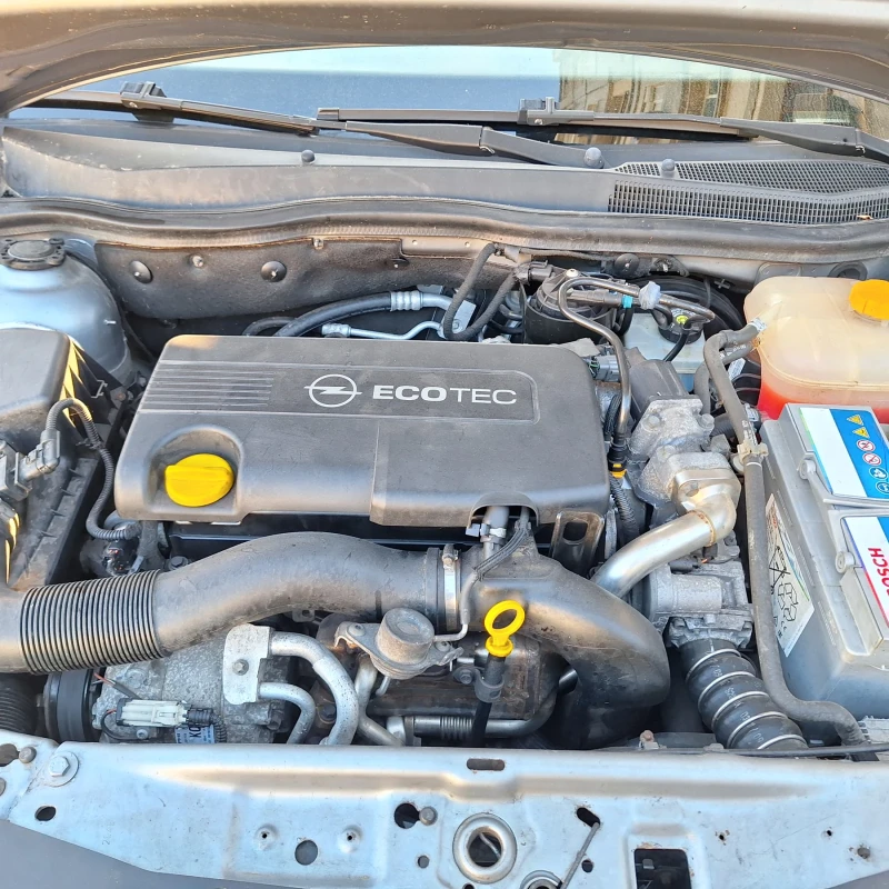 Opel Astra Комби, снимка 13 - Автомобили и джипове - 52812955