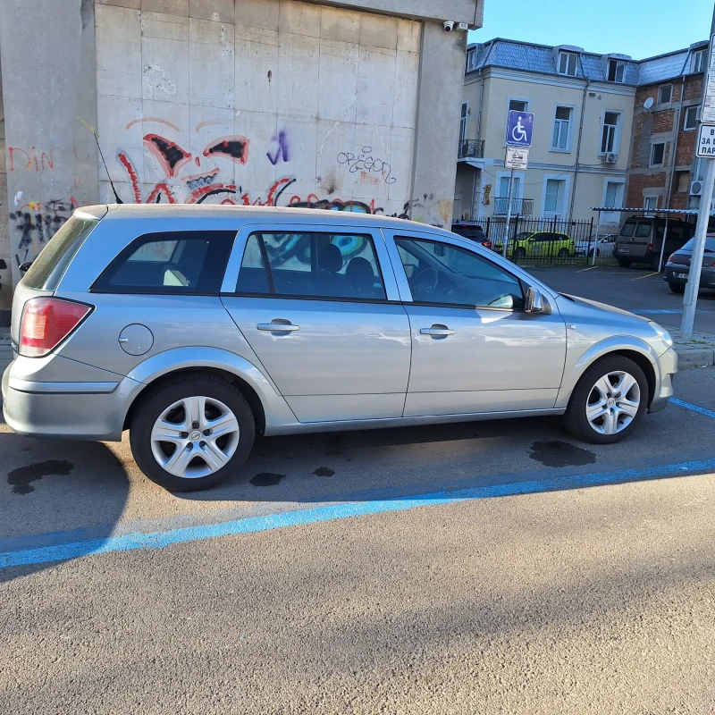 Opel Astra Комби, снимка 9 - Автомобили и джипове - 52812955
