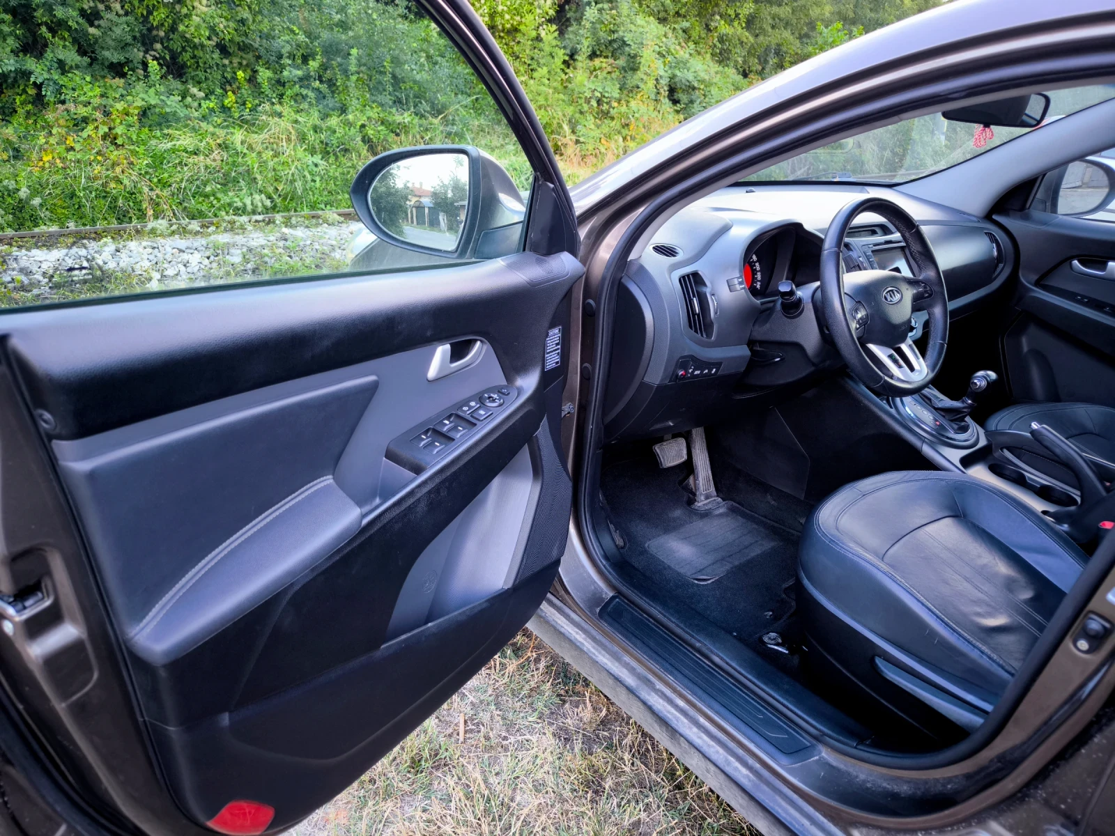 Kia Sportage 2.0 CRDI, снимка 13 - Автомобили и джипове - 56114942