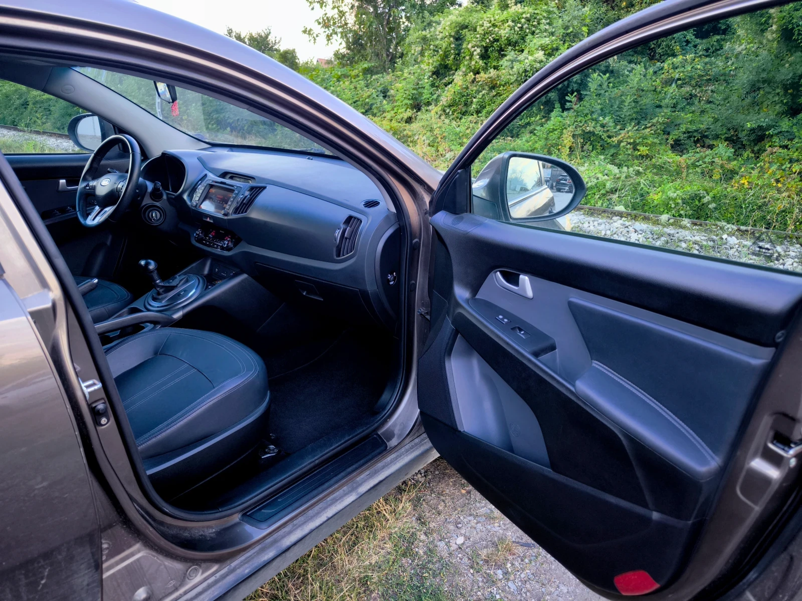 Kia Sportage 2.0 CRDI, снимка 14 - Автомобили и джипове - 56114942