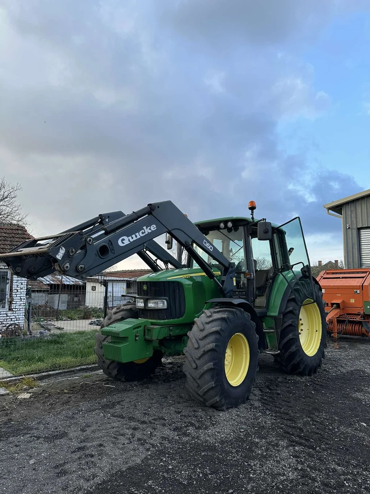 Трактор John Deere 6420 - изображение 2