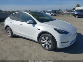 ������ Tesla Model Y