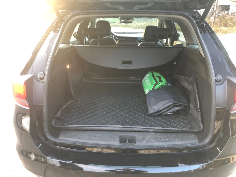 Opel Astra Sports Tourer, снимка 5 - Автомобили и джипове - 52191410