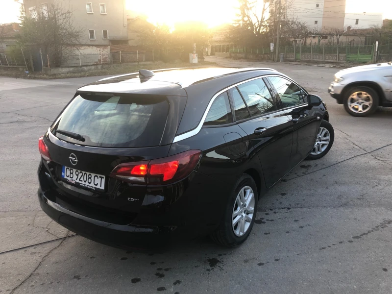 Opel Astra Sports Tourer, снимка 3 - Автомобили и джипове - 52191410