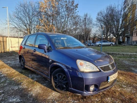     Suzuki Liana 1.6 4x4 .