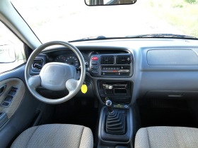 Suzuki Grand vitara 2.0TDI, снимка 8 - Автомобили и джипове - 45472009