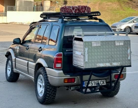 Suzuki Grand vitara 2.5i V6* OFFROAD* IRONMAN* 4X4* ГАЗ - 7055 € / 13798.38 лв. - 92735201 7