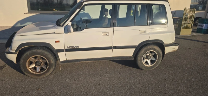 Suzuki Vitara 1.6i, снимка 6 - Автомобили и джипове - 52730981