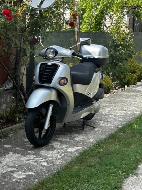 Kymco People  - изображение 1