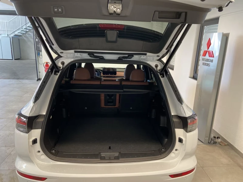 Mitsubishi Outlander 2.4PHEV/306HP/TOP/PANO/360/HUD/MEMO/YAMAHA/666g, снимка 6 - Автомобили и джипове - 52739841