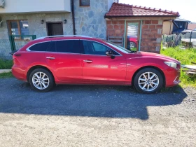 ������ Mazda 6