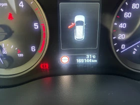 Hyundai Tucson 1.7 CRDI 16V XPossible , снимка 10