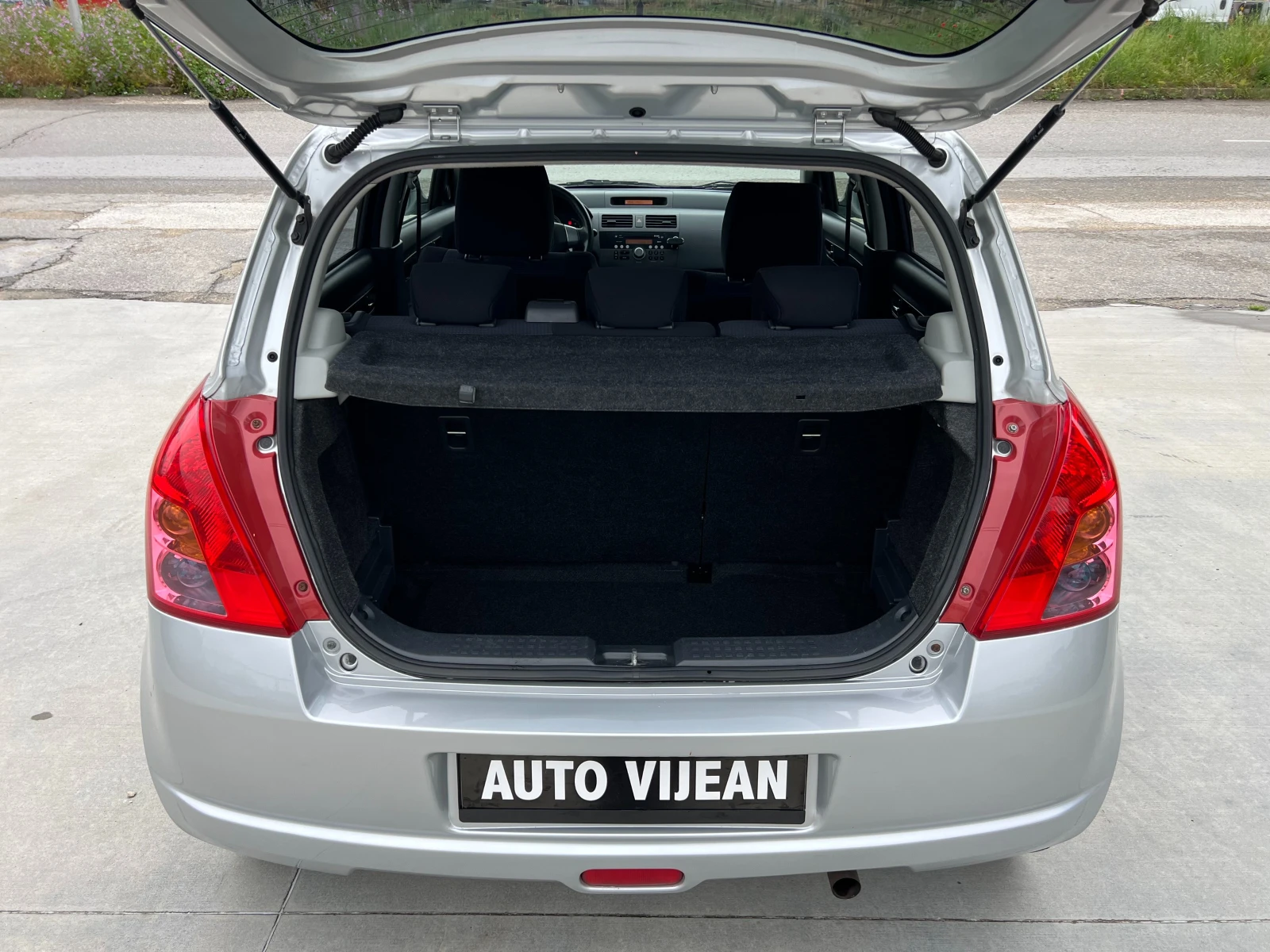 Suzuki Swift 1.3i-92к.с-4х4, снимка 7 - Автомобили и джипове - 54727683