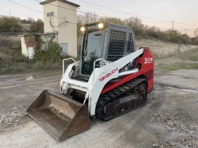 Мини челни товарачи Takeuchi, снимка 1