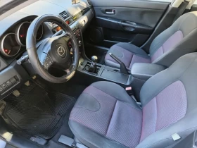 Mazda 3 1.6 105кс - изображение 9