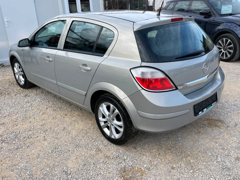 Opel Astra 1.8i/125/АВТОМАТИК/НОВИ ГУМИ/КАТО НОВА!, снимка 6 - Автомобили и джипове - 49104012