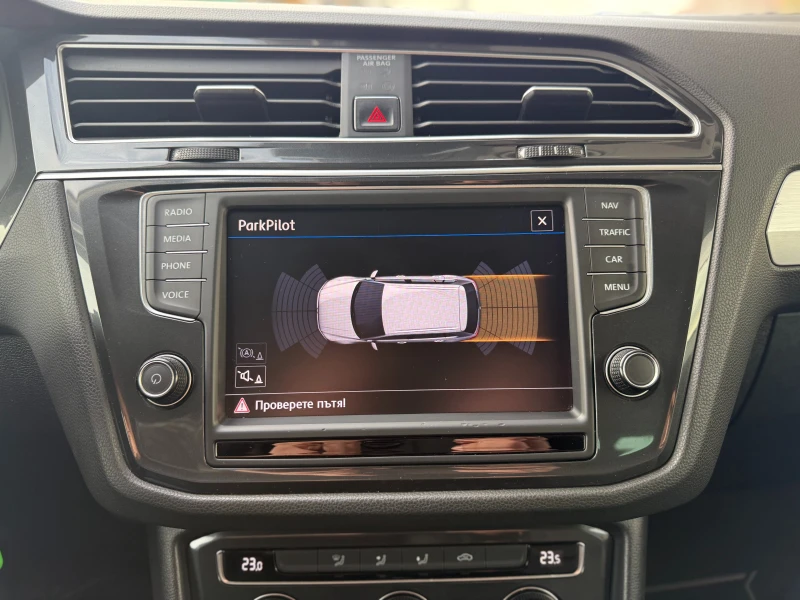 VW Tiguan 6 МЕСЕЦА ГАРАНЦИЯ/2.0TDI 140к.с. Автоматик, снимка 10 - Автомобили и джипове - 52733145