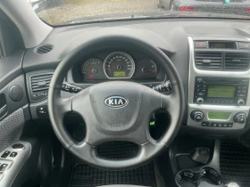 Kia Sportage 2.0 i, снимка 16