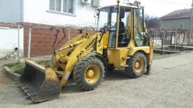 Багер Komatsu wb70a, снимка 1