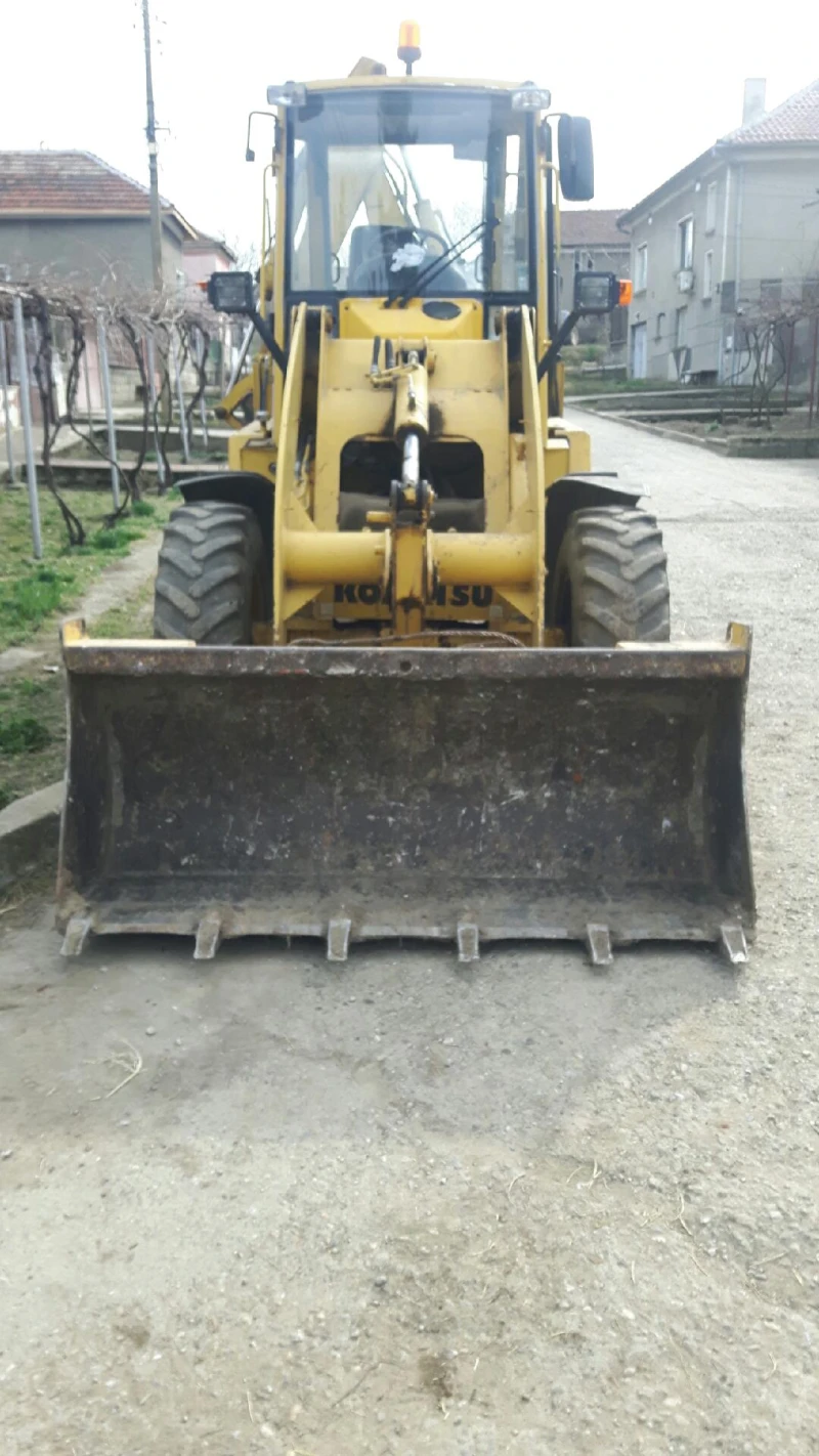 Багер Komatsu wb70a, снимка 3 - Индустриална техника - 47556078