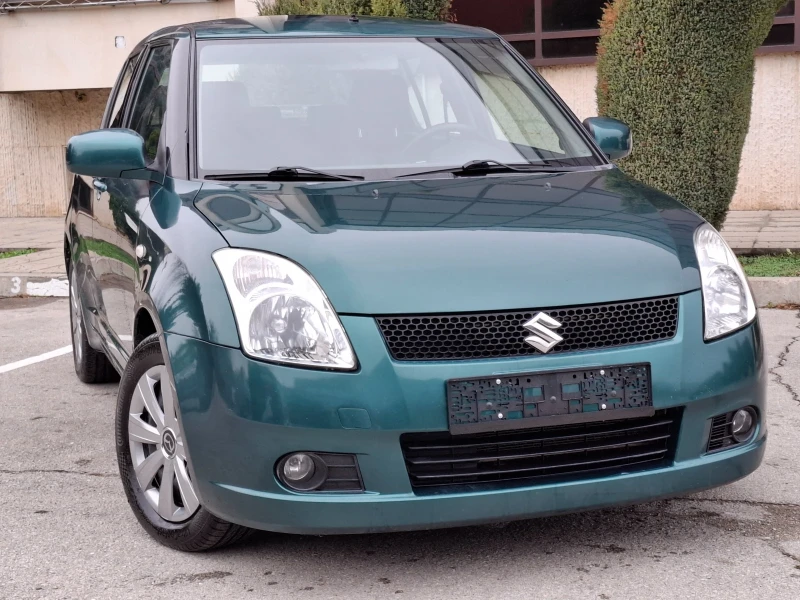 Suzuki Swift 1.3i 90hp * EURO 4 * КЛИМАТИК * , снимка 3 - Автомобили и джипове - 48176320