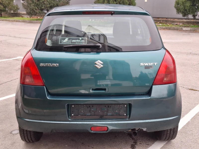 Suzuki Swift 1.3i 90hp * EURO 4 * КЛИМАТИК * , снимка 6 - Автомобили и джипове - 48176320