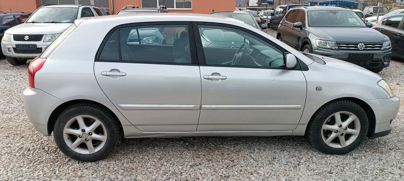 Toyota Corolla 2.2D4D, снимка 8 - Автомобили и джипове - 48343956