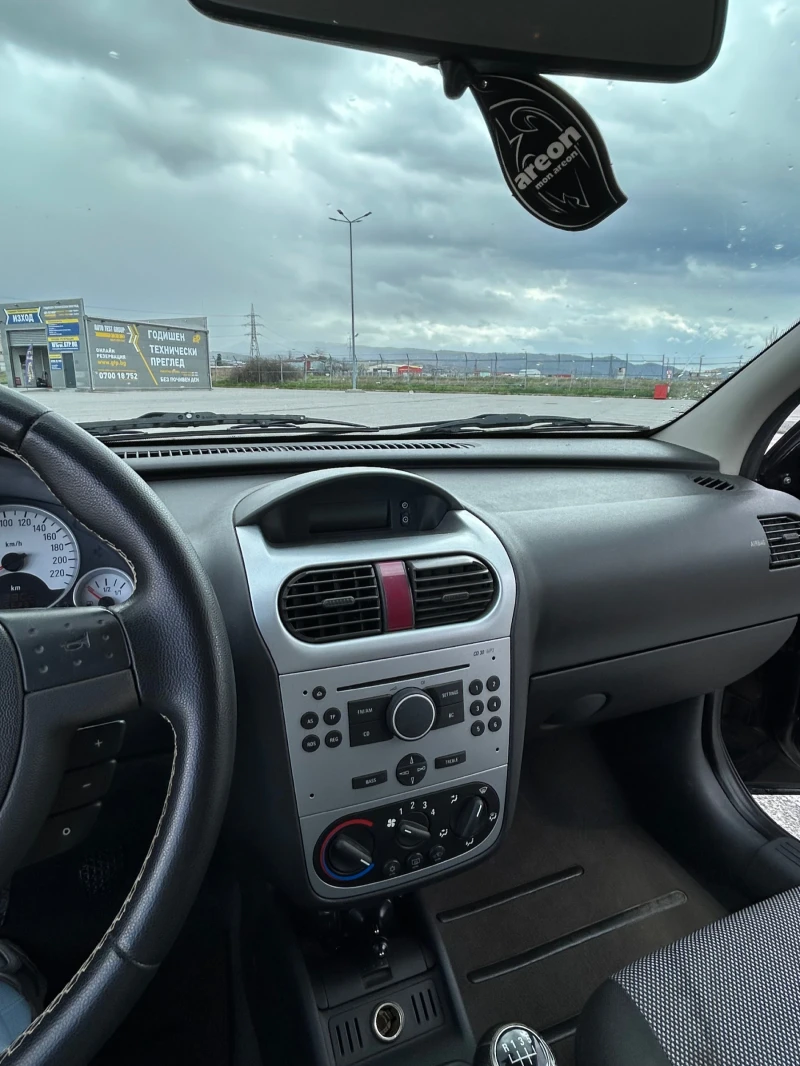 Opel Corsa 1.2, снимка 10 - Автомобили и джипове - 52407871
