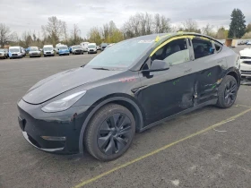 ������ Tesla Model Y