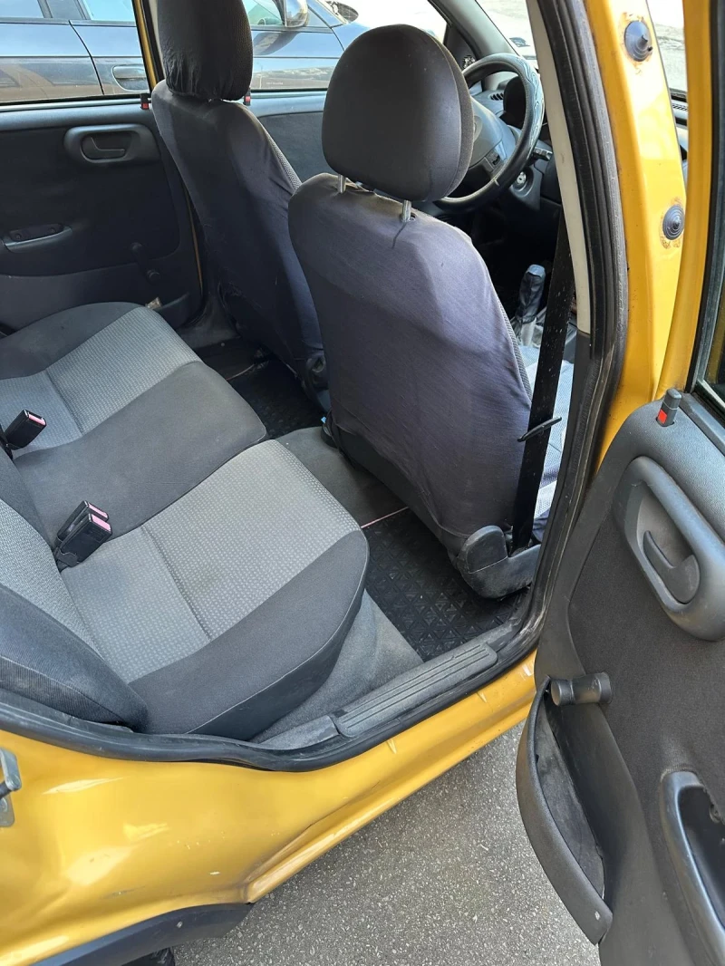 Opel Corsa 1.0i Газово, снимка 9 - Автомобили и джипове - 52612424