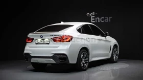 BMW X6 M50D M SPORT + HEAD UP/360/PANO/FULL - 19750 € / 38627.64 лв. - 12192346 2