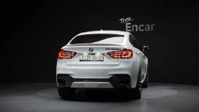 BMW X6 M50D M SPORT + HEAD UP/360/PANO/FULL - 19750 € / 38627.64 лв. - 12192346 4