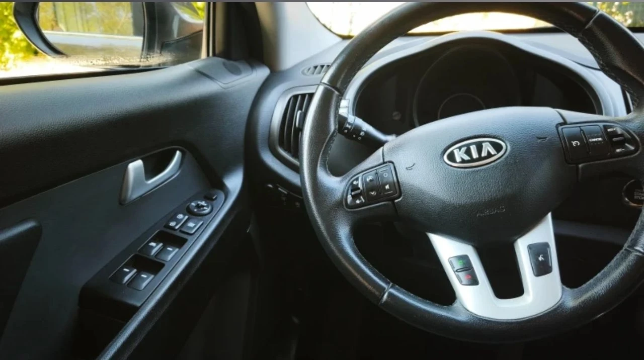 Kia Sportage, снимка 6 - Автомобили и джипове - 56318042