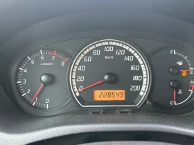 Suzuki Swift 1.3i 90 к.с, снимка 9