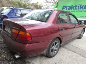 Mitsubishi Carisma 1.6 GLX Газов инжекцион, снимка 1