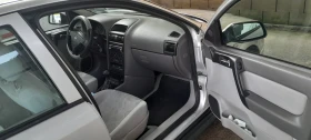 Opel Astra 1.8 16v Avtomat, Хечбек, Употребяван, Разград - 1700 € / 3324.91 лв. - 30147913 9