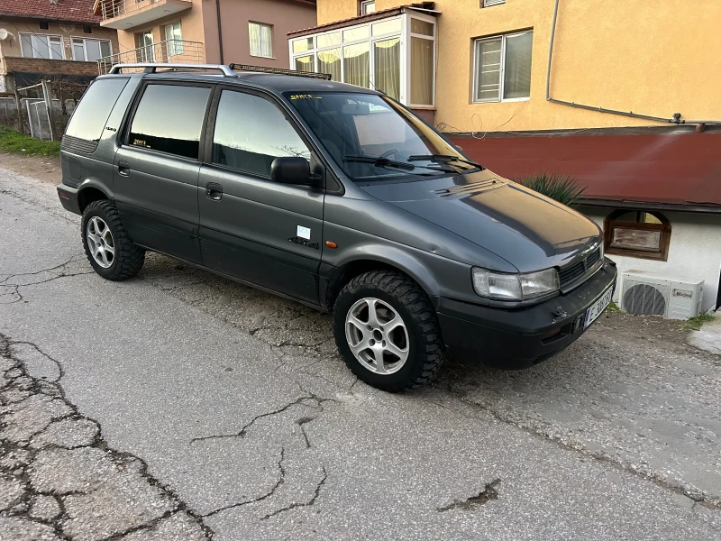 Mitsubishi Space wagon 1.8 Бензин-Газ 4х4 7 местен, снимка 15 - Автомобили и джипове - 52924259