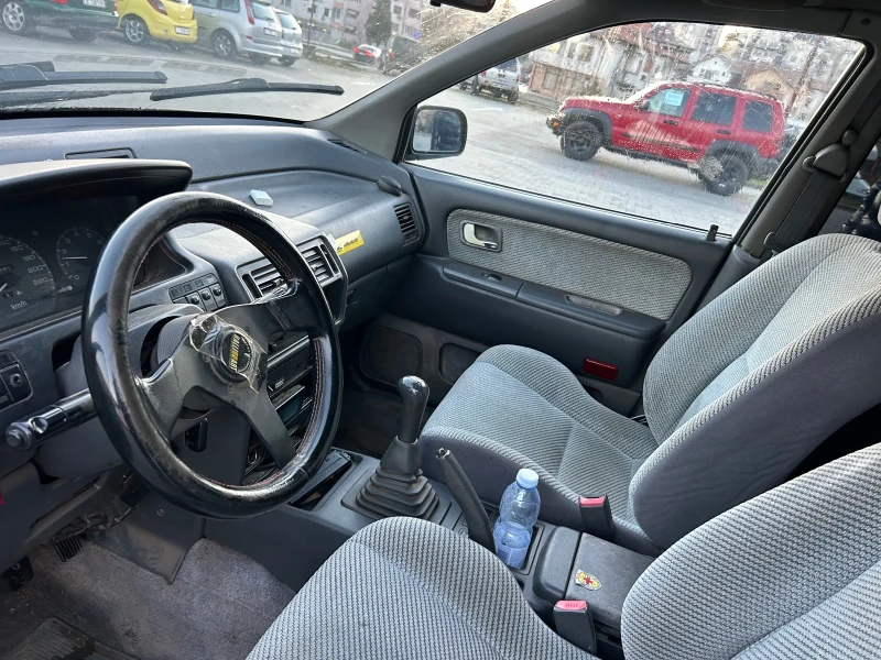 Mitsubishi Space wagon 1.8 Бензин-Газ 4х4 7 местен, снимка 9 - Автомобили и джипове - 52924259