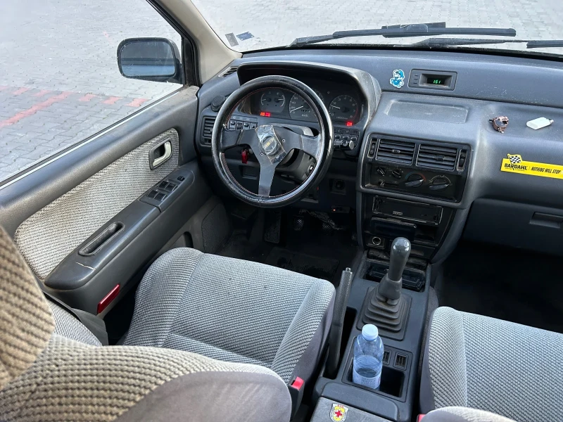 Mitsubishi Space wagon 1.8 Бензин-Газ 4х4 7 местен, снимка 16 - Автомобили и джипове - 52924259