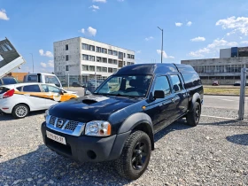 ������ Nissan Navara