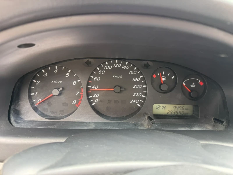 Nissan Almera N16, снимка 6 - Автомобили и джипове - 48878870