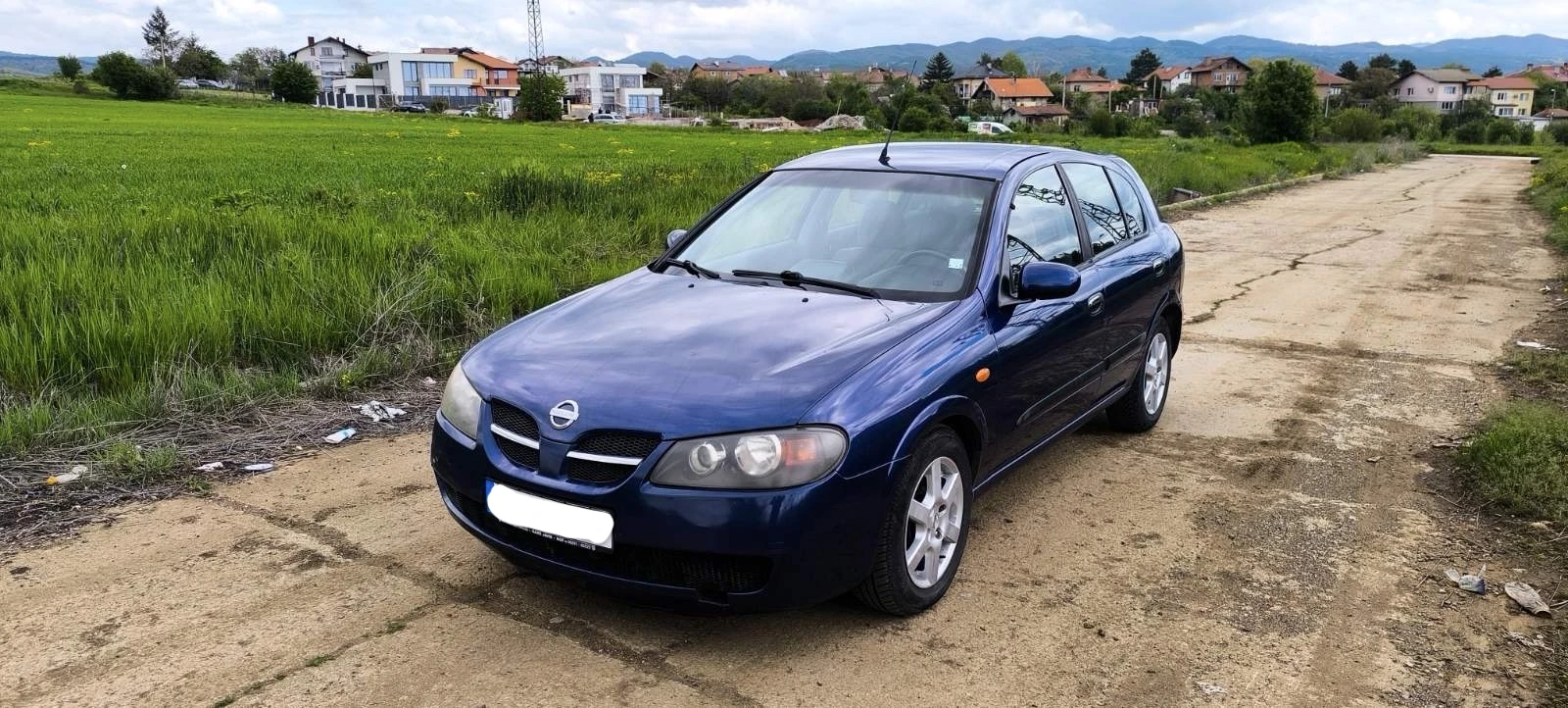 Nissan Almera, снимка 6 - Автомобили и джипове - 54440187