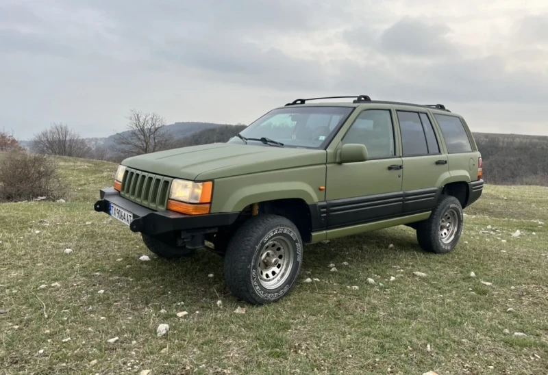 Jeep Grand cherokee 5.2 газ бензин, снимка 1 - Автомобили и джипове - 47528472