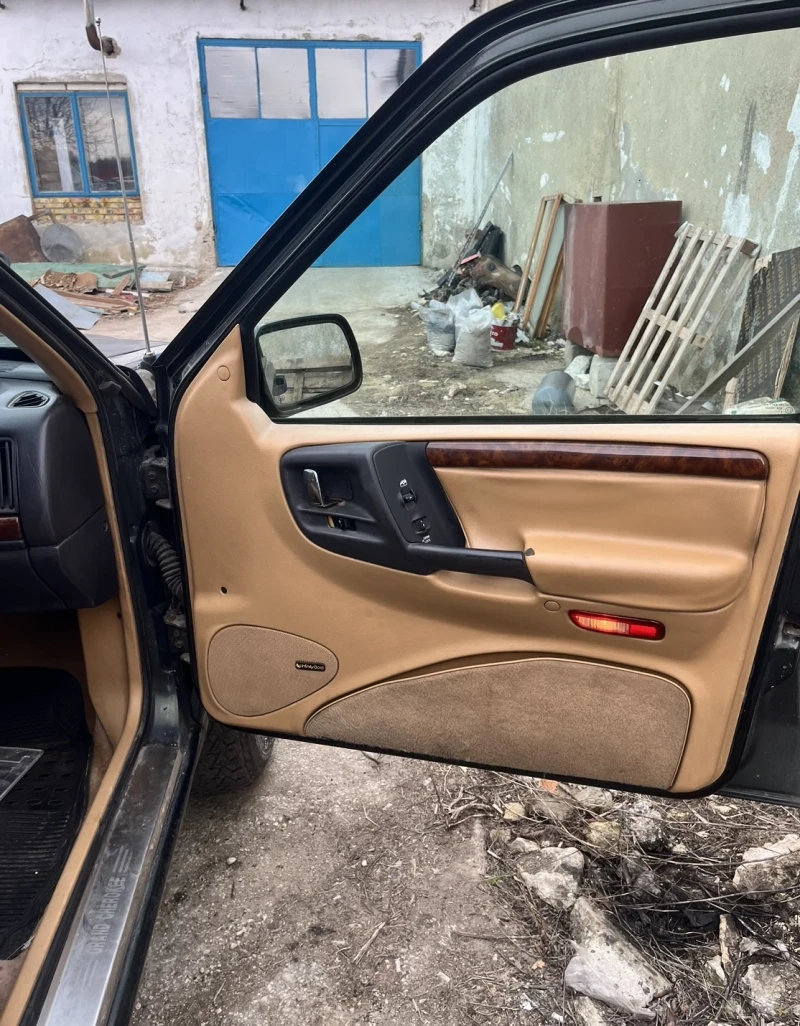 Jeep Grand cherokee 5.2 газ бензин, снимка 13 - Автомобили и джипове - 47528472